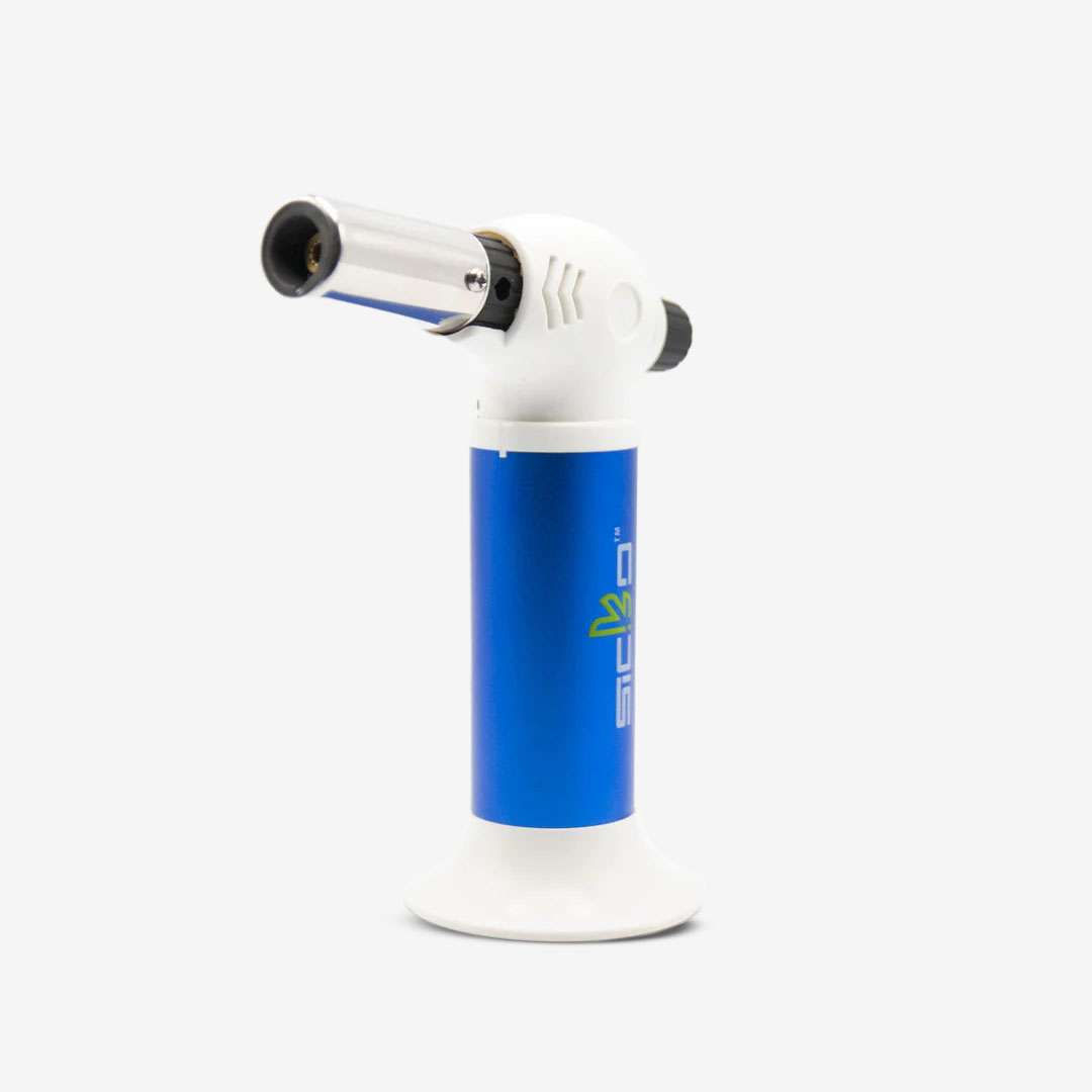 SKT-001 Butane Power Pro-Torch SKT-001 Butane Power Pro-Torch in Red, Blue, Silver, White, and Black – refillable wind-resistant torch lighter with adjustable flame, ideal for culinary, dabbing, and wholesale smoke shop supply.