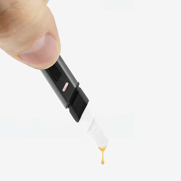 Hot Knife – Heated Loading Tool a hand holding a drop of liquid