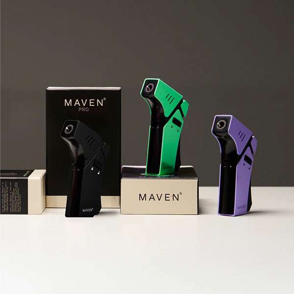 Maven Pro Butane Torch in Black, Green, and Purple – High-performance table torch with windproof flame, ergonomic grip, and refillable tank. Perfect for wholesale smoke shop supply.